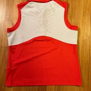 Nike Golf Ladies Large Sleeveless golf shirt with back cut outs.
